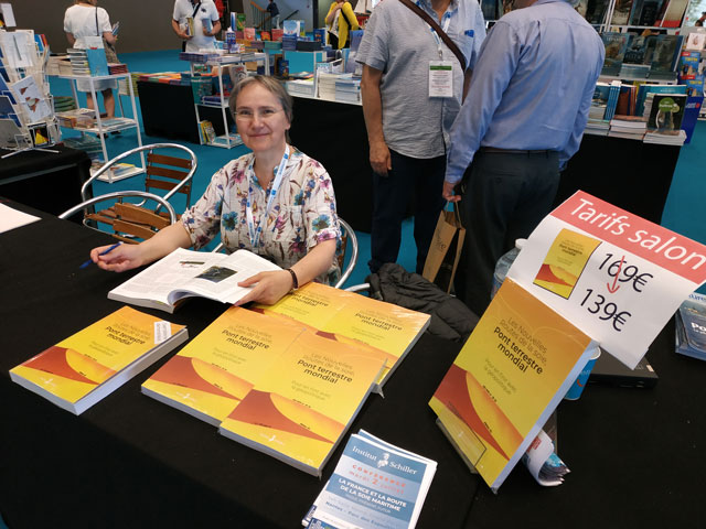 Odile Mojon at the literature table during the La Mer Expo.